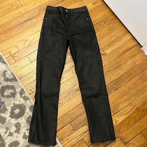 Black coated high waisted kick flare jeans